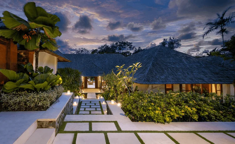 Villa Frangipani entrance at night