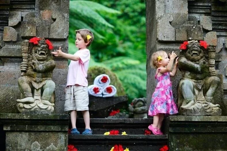 Children playing at the entrance of Villa Frangipani Canggu — a family-friendly Bali villa